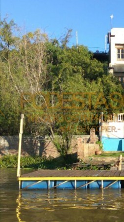 VENDO TERRENO SOBRE LA COSTA (CON SALIDA AL RIO PARANA)