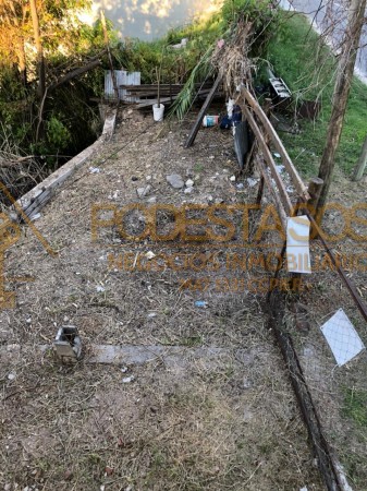 VENDO TERRENO SOBRE LA COSTA (CON SALIDA AL RIO PARANA)