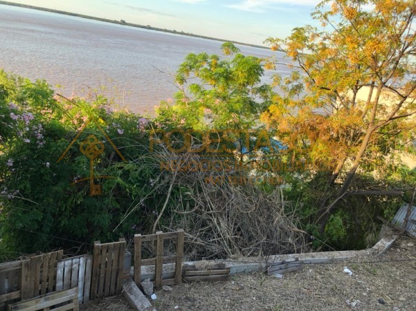 VENDO TERRENO SOBRE LA COSTA (CON SALIDA AL RIO PARANA)