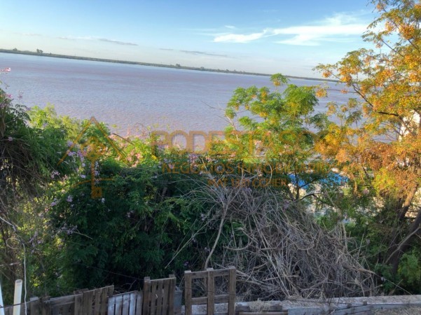 VENDO TERRENO SOBRE LA COSTA (CON SALIDA AL RIO PARANA)